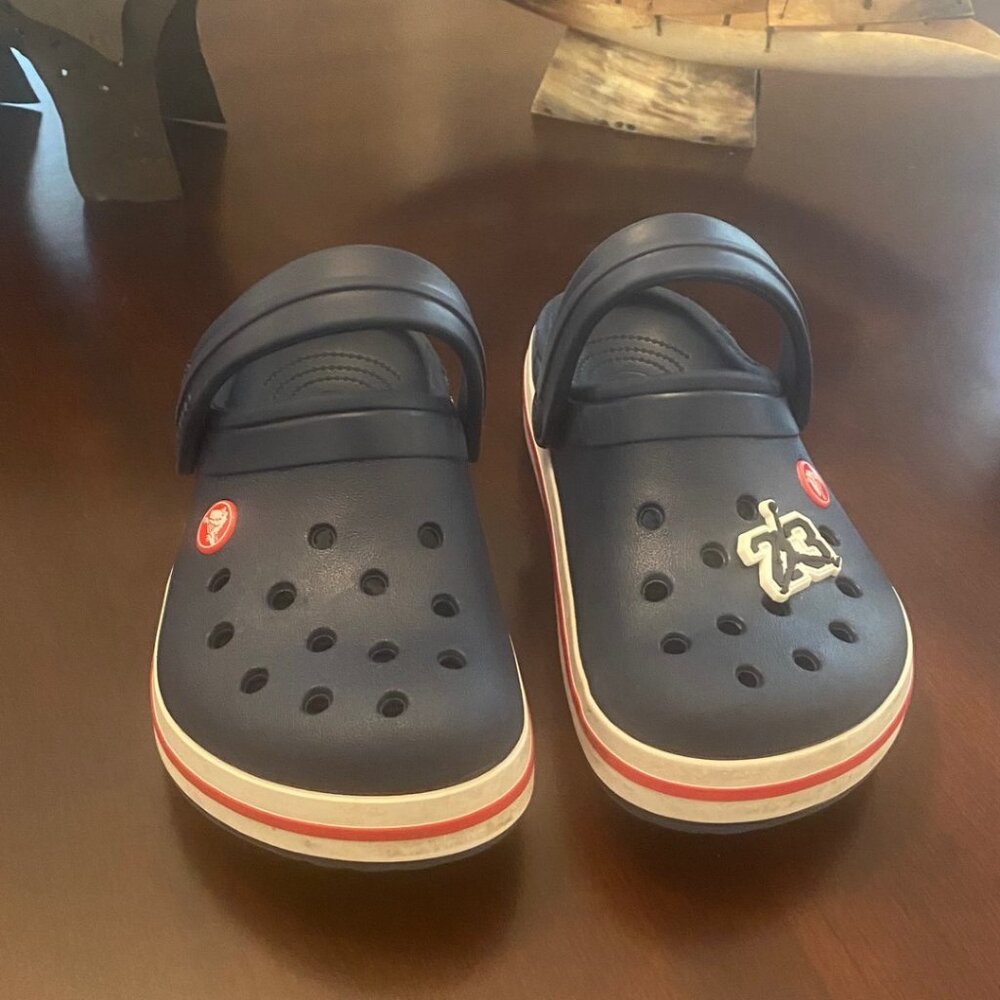 Size 2 Crocs with Michael Jordan "23" signature charm! Very good  condition!